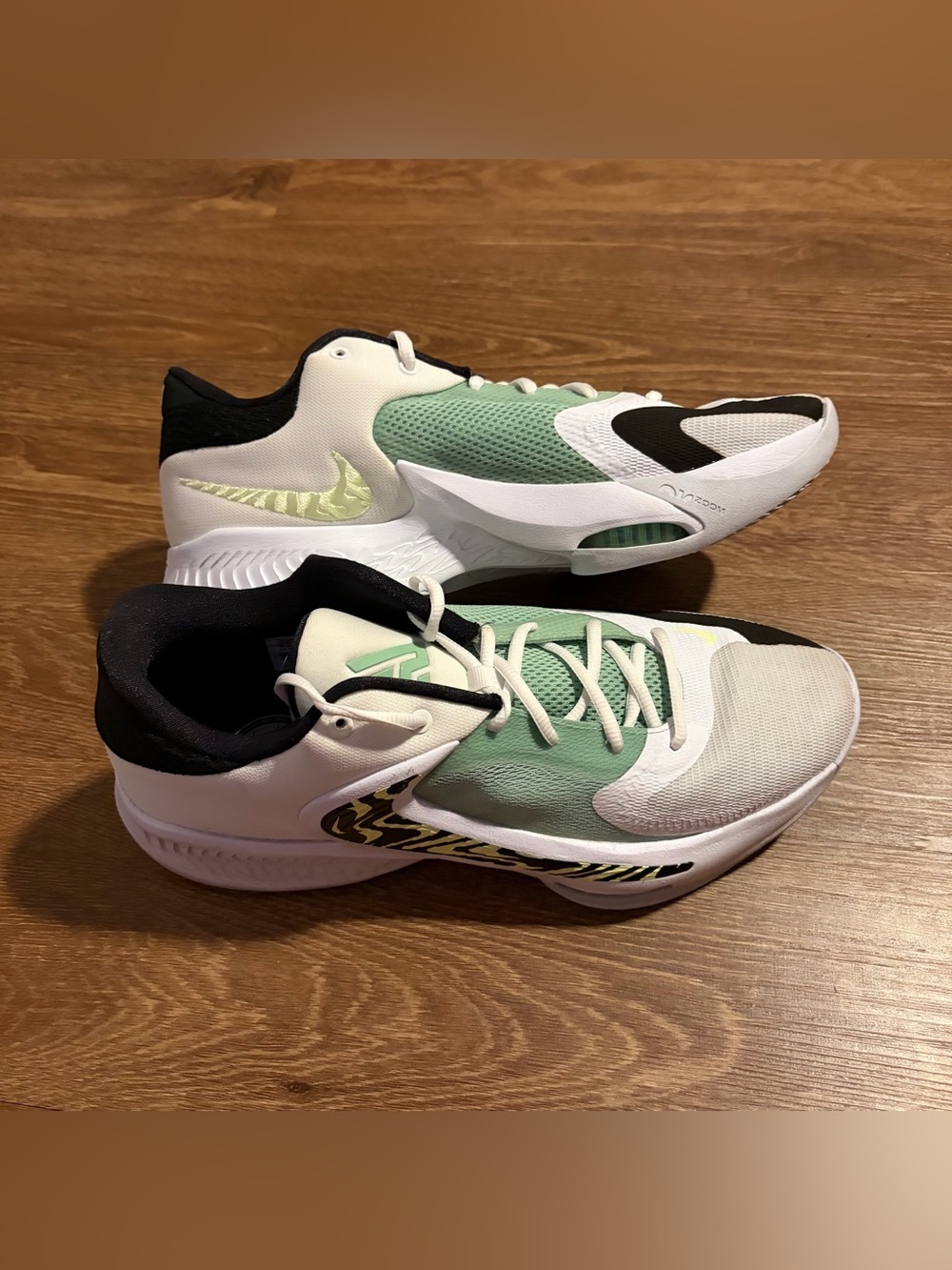 Nike Men’s  zoom freak 4's
colorway: greek coastline
Size 13